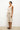 https://cdn.shopify.com/s/files/1/1286/8573/files/LESET_KIM_KIM-PLEATED-CITY-SHORT_SAHARA_ON-MODEL-02_c054ef13-a6c1-4804-9d36-ae4fee31410e.jpg?v=1772558846