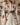 https://cdn.shopify.com/s/files/1/0718/5641/files/THE-GREAT-LOOK-2-THE-WESTERN-EMBROIDERED-COMMODORE-JACKET-CREAM-THE-WESTERN-EMBROIDERED-HIGHLAND-SKIRT-CREAM-016051.jpg?v=1772216551