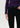 Person wearing a purple long-sleeve top and black pants on a white background