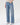 Person wearing light blue jeans on a white background