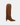 Brown knee-high boot with a textured pattern on a white background
