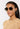 Woman wearing sunglasses with a plain background