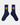 Navy blue socks with smiley face design on a light gray background