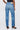 Person wearing blue jeans on a white background