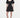 Black dress worn by a model on a white background