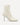 White ankle boot with a high heel on a white background